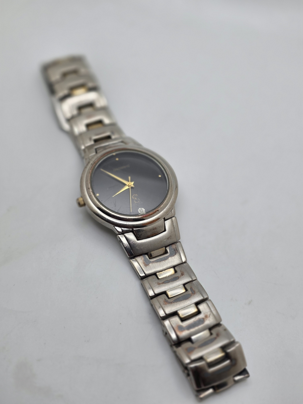 Stainless Steel Silver and Gold Accent Men's Watch with Black Dial